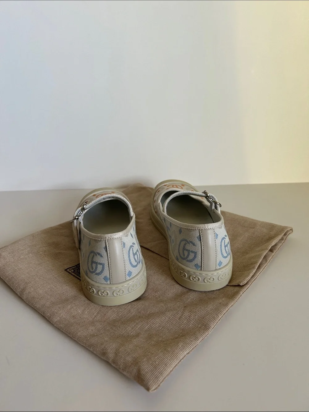 Gucci Ivory Canvas Mary Jane Flats with Pastel Logo Print